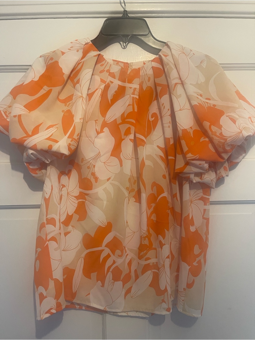 entro Cream Top with Bold Orange Floral Motif